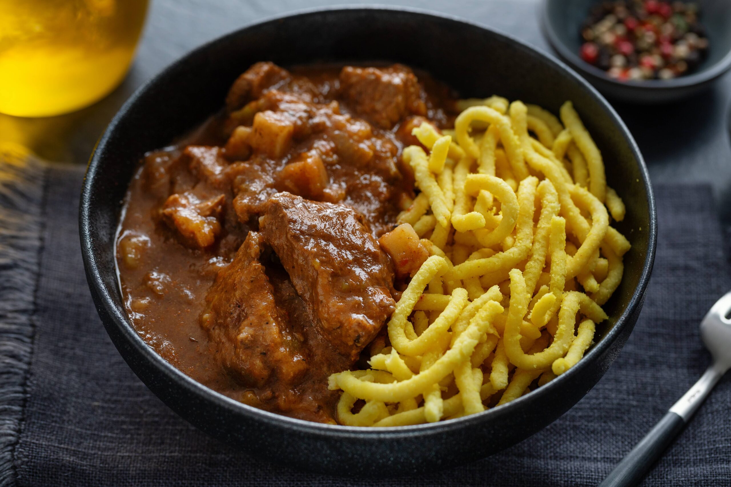 meat ragout stew with noodles in bowl 2024 10 23 03 54 06 utc scaled