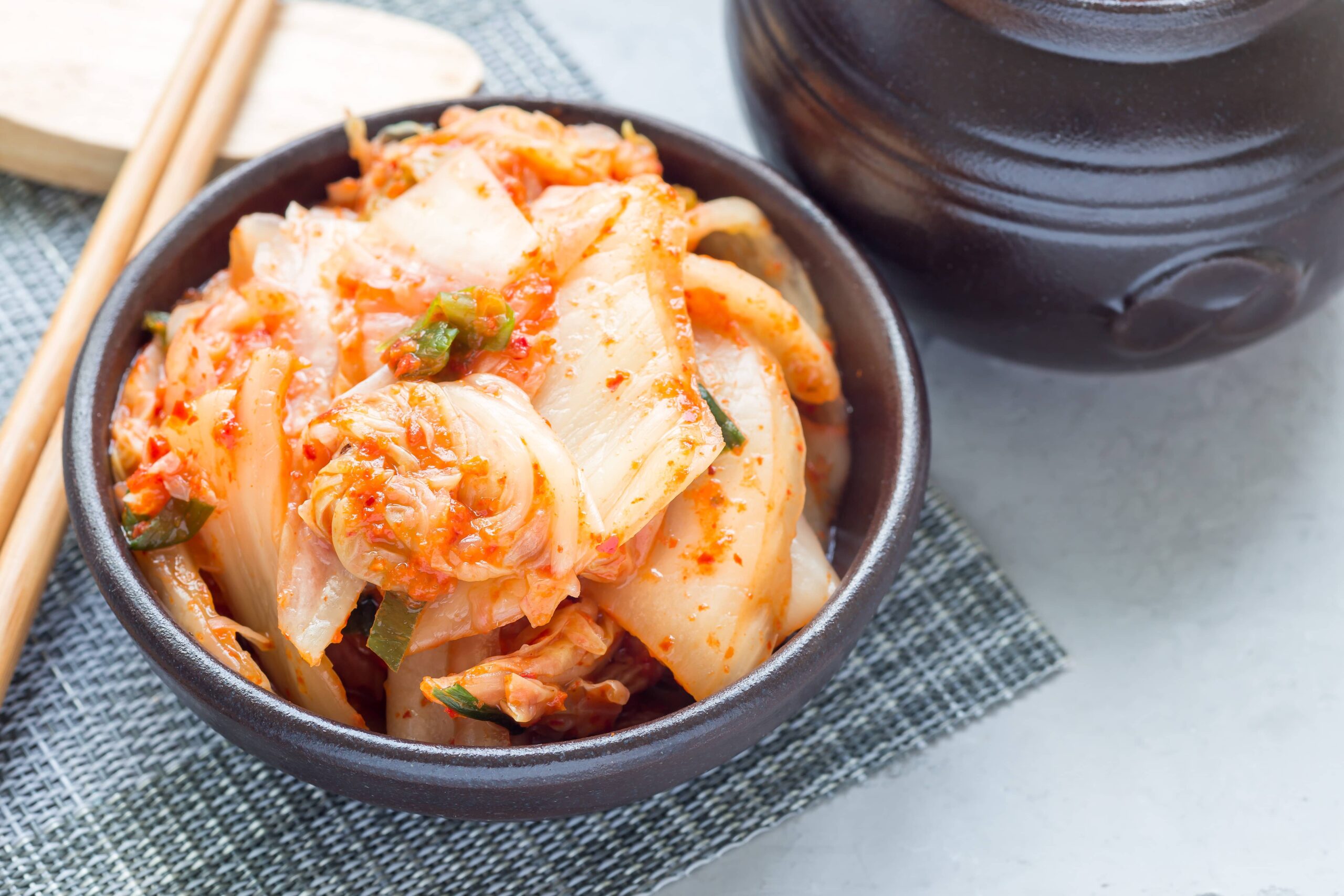 kimchi cabbage korean appetizer in ceramic bowl 2023 11 27 05 23 00 utc scaled